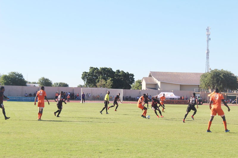 Orange FA cup action between Orapa United (in Orange) and Security Systems