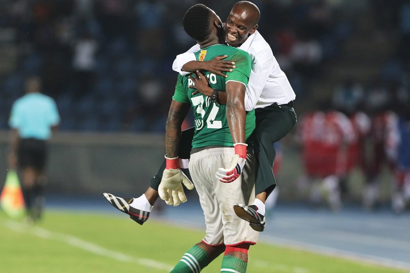Gaborone United coach, Philemon Makhwengwe celebrates his side's victory with goalkeeper, Goitseone Phoko {IC: KENNEDY RAMOKONE