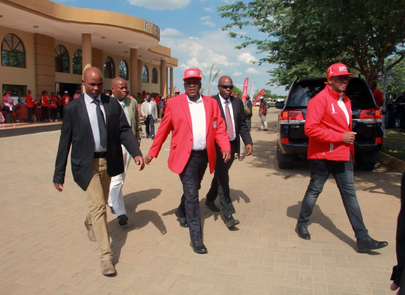DISS Director General Peter Magosi escorting President Masisi recently at Palapye during the BDP reterat PIC: KEOAGILE BONANG..