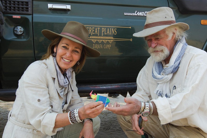 Beverly and Dereck Joubert next to their Great Plans Vehicle