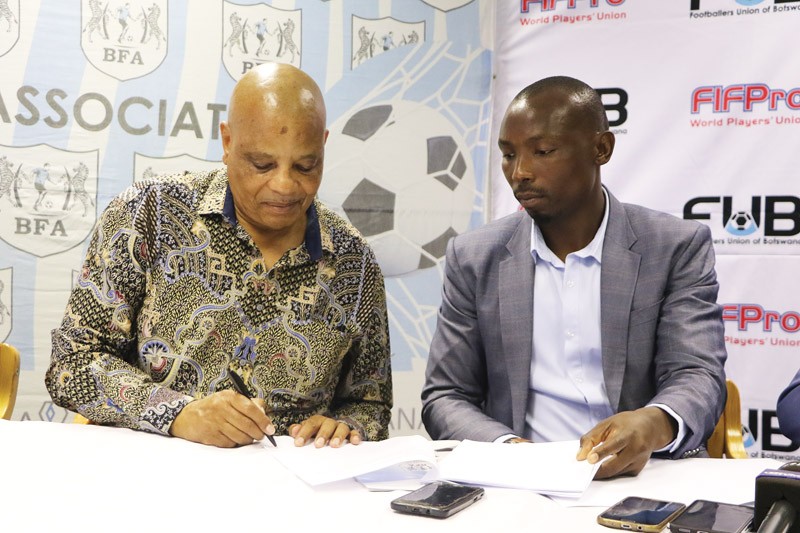 BFA president,Maclean Letshwiti (left) and FUB president, Onalethata Tshekiso signed the MoU yesterday PIC: KENNEDY RAMOKONE